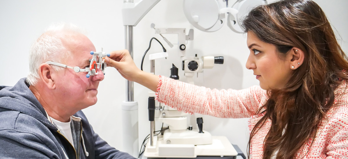 Priyanka adjusting trial frames during an eye examination
